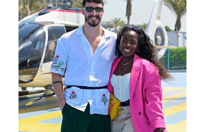 Couple of G taking a helicopter ride in Dubai