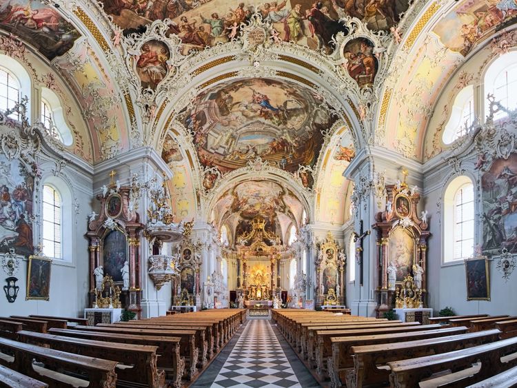 The richly decorated interior of the Wilten basilica