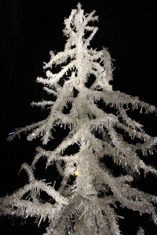 The tree is made up of thousands of swarovski crystals mounted on polished steel.