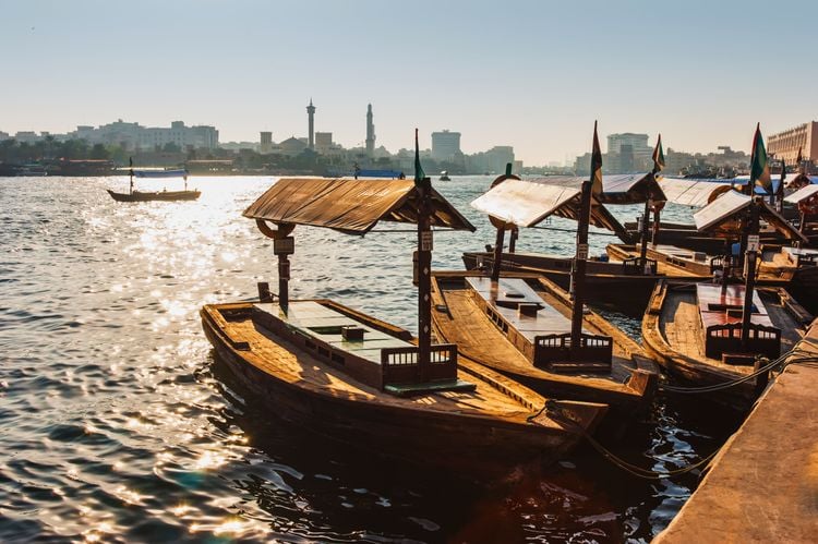 Abras, boats moored in Dubai's cove - Zhukov Oleg / Shutterstock